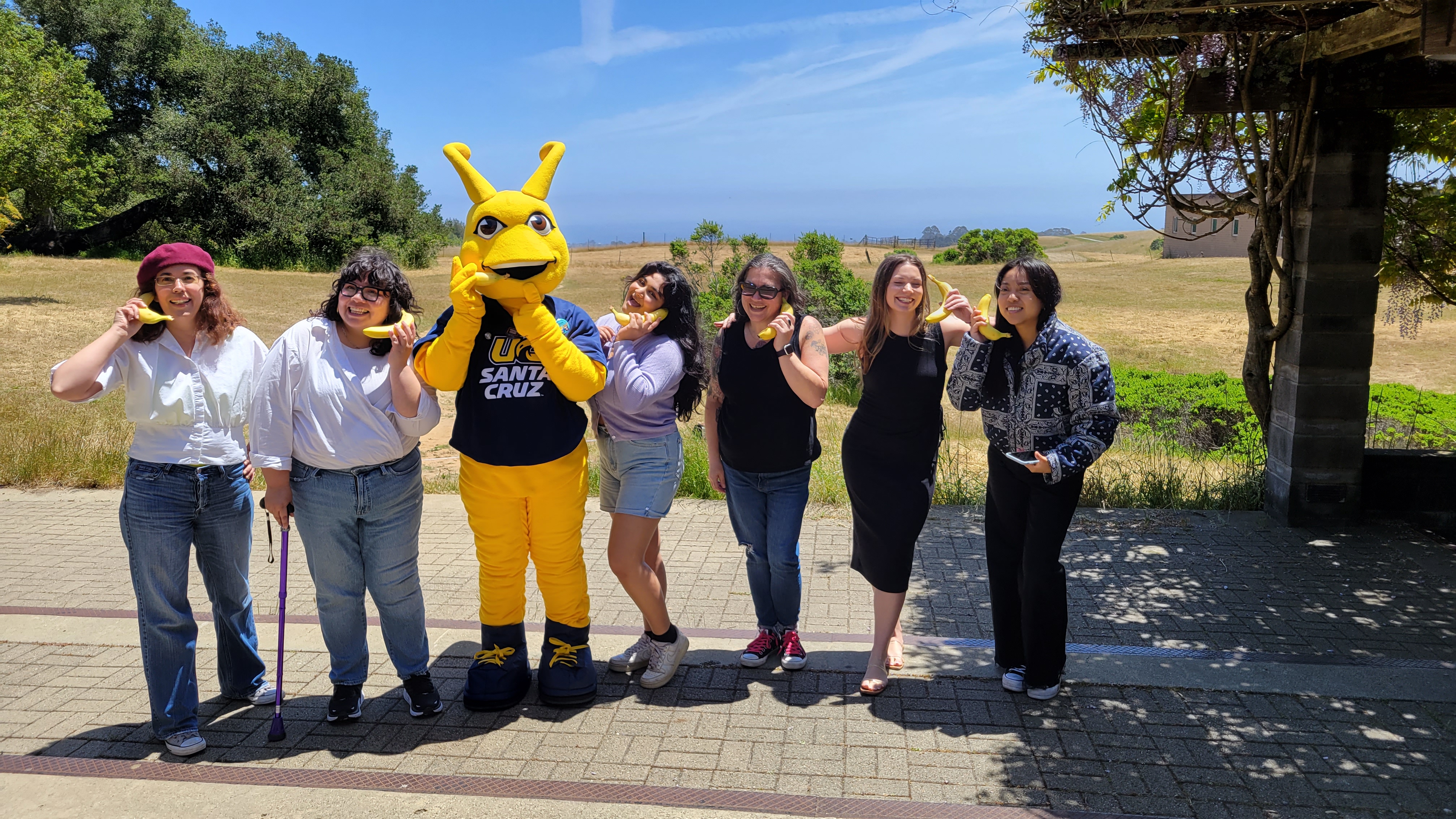 LSS team with Sammy the Slug at outdoor end-of-year tutor celebration.